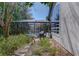 Tranquil screened pool with lush backyard plants at 320 Remington Dr, Oviedo, FL 32765