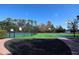 Community basketball court with well-maintained surface and scenic views of the lake at 320 Remington Dr, Oviedo, FL 32765