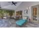 Relaxing outdoor patio with comfortable seating, chaise lounge, and stylish decor at 320 Remington Dr, Oviedo, FL 32765