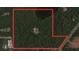 Aerial view of property boundaries with a small pond and forested area at 32325 State Road 44, Eustis, FL 32736
