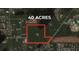 Aerial view showcases the expansive 40-acre property, surrounded by lush greenery and serene natural landscapes at 32325 State Road 44, Eustis, FL 32736