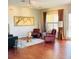 Living room featuring wood floors and bright lighting at 3368 Robert Trent Jones Dr # 40808, Orlando, FL 32835