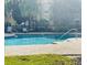 Community pool featuring lounge chairs, palm trees, and a relaxing atmosphere at 3368 Robert Trent Jones Dr # 40808, Orlando, FL 32835