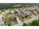 Neighborhood aerial view showing the property, surrounding homes, and lush green landscape at 350 Black Springs Ln, Winter Garden, FL 34787
