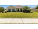 Charming home with a well-kept lawn, beautiful landscaping, and inviting curb appeal at 350 Black Springs Ln, Winter Garden, FL 34787
