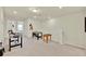 Upstairs bonus room featuring a pool table and view of a bedroom at 3729 Pacific Ln, Davenport, FL 33897