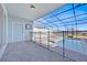 Enclosed pool area with brick pavers and a clear blue sky at 3729 Pacific Ln, Davenport, FL 33897