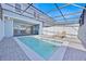 Covered pool and patio area, perfect for enjoying outdoor living at 3729 Pacific Ln, Davenport, FL 33897