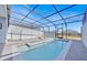 Backyard pool with lounge chairs, creating a relaxing retreat at 3729 Pacific Ln, Davenport, FL 33897