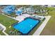 Community basketball court and sand volleyball area, perfect for outdoor activities at 3838 Lana Ave, Davenport, FL 33897