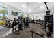 Brightly lit gym with a variety of exercise machines and equipment at 3838 Lana Ave, Davenport, FL 33897