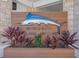 Signage for Windsor Island Resort with marlin sculpture and tropical plants at 3838 Lana Ave, Davenport, FL 33897