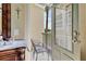 Private balcony with chairs and a table, offering a view of palm trees at 458 Ellis Square Ct, Sanford, FL 32771