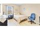 Cozy bedroom with light walls, window, and dark furniture for storage at 458 Ellis Square Ct, Sanford, FL 32771