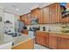 Modern kitchen features granite countertops, stainless steel appliances, and ample cabinet space at 458 Ellis Square Ct, Sanford, FL 32771