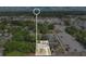 Highlighted aerial view pinpointing property location near shopping centers and residential areas at 4646 Old Road 37, Lakeland, FL 33813
