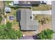 Aerial view of a well-maintained property with a spacious backyard, patio, and convenient driveway at 4646 Old Road 37, Lakeland, FL 33813