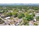 Scenic aerial perspective of a residential neighborhood with tree-lined streets and well-maintained homes at 4646 Old Road 37, Lakeland, FL 33813