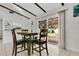 Bright dining area with tile floors and sliding glass doors leading to the outdoor space at 4646 Old Road 37, Lakeland, FL 33813