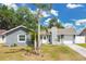 Inviting single-story home featuring a well-kept front yard and mature landscaping for enhanced curb appeal at 4646 Old Road 37, Lakeland, FL 33813