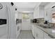 Bright kitchen features modern appliances and a window with natural light at 4646 Old Road 37, Lakeland, FL 33813