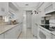 Bright, functional kitchen with tile countertops and flooring and ample storage space at 4646 Old Road 37, Lakeland, FL 33813