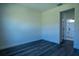 Clean bedroom with wood floors, soft white walls and large closet at 5 Fisher Loop, Ocklawaha, FL 32179