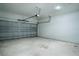 Spacious garage with roll up doors and concrete floors at 5 Fisher Loop, Ocklawaha, FL 32179
