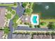 Overhead aerial showcasing the community pool and clubhouse with lake views at 5412 Factors Walk Dr, Sanford, FL 32771