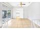 Bright living room with tile floors, slider door to the patio and an open layout at 621 Ashberry Ln, Altamonte Springs, FL 32714