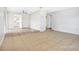 Spacious living room featuring neutral color palette and tile flooring at 621 Ashberry Ln, Altamonte Springs, FL 32714