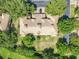 Aerial view of a residential community featuring lush greenery and mature landscaping at 6240 Miramonte Dr # 102, Orlando, FL 32835