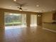 Open living space features tile floors and sliding doors leading to an outdoor area for easy access at 6240 Miramonte Dr # 102, Orlando, FL 32835