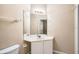 Bathroom with a white sink vanity and large mirror at 6402 Cava Alta Dr # 107, Orlando, FL 32835