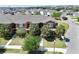 Nice aerial view of townhomes with mature landscaping, orderly streets, and well maintained lawns at 6524 Calamondin Dr, Winter Garden, FL 34787