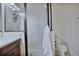 This bathroom includes a glass shower, modern vanity with a single sink, and a ceramic tile floor at 6524 Calamondin Dr, Winter Garden, FL 34787