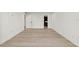 A bright room with recessed lighting, wood floors, and clean white walls at 690 Osceola Ave # 502, Winter Park, FL 32789