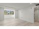Sunlit room featuring recessed lighting, wood floors, and a balcony at 690 Osceola Ave # 502, Winter Park, FL 32789