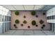 Beautiful courtyard featuring lush greenery and cozy seating areas for residents to enjoy at 690 Osceola Ave # 502, Winter Park, FL 32789