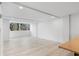 Spacious living space featuring modern finishes and luxury vinyl plank flooring at 690 Osceola Ave # 502, Winter Park, FL 32789
