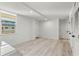 Bright, airy living space featuring modern finishes and luxury vinyl plank flooring at 690 Osceola Ave # 502, Winter Park, FL 32789