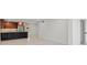 Open-concept living space featuring updated kitchen, modern finishes, and luxury vinyl plank flooring at 690 Osceola Ave # 502, Winter Park, FL 32789