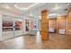 Welcoming lobby area with modern decor, wood accents, comfortable seating, and convenient access to the garage at 690 Osceola Ave # 502, Winter Park, FL 32789