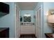 Spacious main bathroom features dual closets, sink and vanity with great natural light at 735 Oak Ter, Orange City, FL 32763