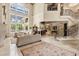 Elegant foyer boasts soaring ceilings, a grand staircase with iron railings, and marble flooring at 8590 Apache Trl, Kissimmee, FL 34747