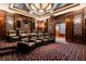 Upscale home theater offers plush seating, a large screen, custom lighting, and premium sound for ultimate entertainment at 8590 Apache Trl, Kissimmee, FL 34747