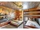 Unique themed bedroom featuring bunk beds and custom wall art at 8969 Stinger Dr, Davenport, FL 33896