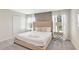 Bright bedroom with neutral tones, ample natural light, and closet space at 8969 Stinger Dr, Davenport, FL 33896