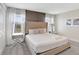 Comfortable bedroom with neutral tones, ample natural light, and closet space at 8969 Stinger Dr, Davenport, FL 33896