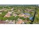 A charming neighborhood with serene pond views, lush trees and a community tennis court at 9178 Panzani Pl, Windermere, FL 34786